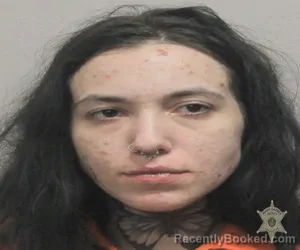 Recent Mugshot Image for MAGGIE LYNN MIGUEZ in Lafayette Parish, Louisiana