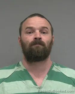 Mugshot of JUSTIN LEE GREENE