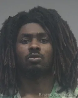 Mugshot of JACQUEEZ JERMAINE ATRAYU CHRISTO