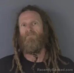 Mugshot of AARON BREU