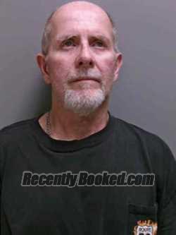 Booking photo from Lee County, Iowa