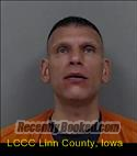 Booking photo from Linn County, Iowa