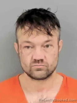 Booking photo from Marion County, Iowa