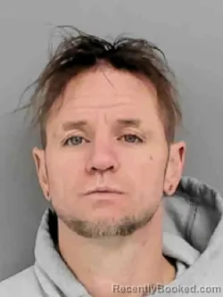 Mugshot of MATTHEW ALLEN REISINGER