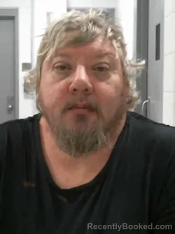 Booking photo from Muscatine County, Iowa