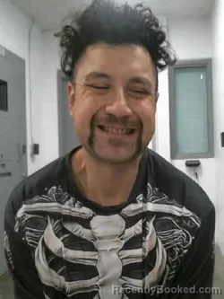 Booking photo from Muscatine County, Iowa