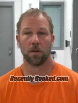 Booking photo from Muscatine County, Iowa