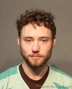 Mugshot of LOGAN KENNETH REYNOLDS