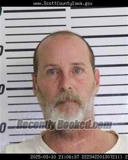 Booking photo from Scott County, Iowa