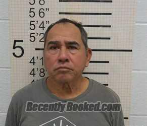 Booking photo from Warren County, Iowa