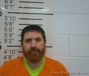 Booking photo from Warren County, Iowa