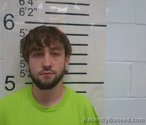 Booking photo from Warren County, Iowa