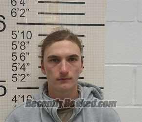 Booking photo from Warren County, Iowa