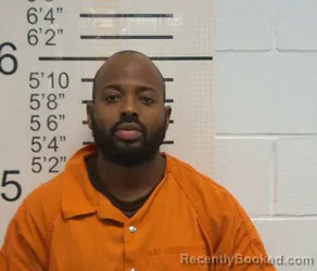 Booking photo from Warren County, Iowa