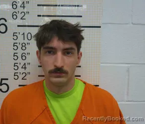 Booking photo from Warren County, Iowa