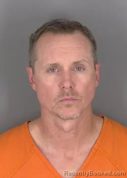 Mugshot of DUSTIN E LOTZ