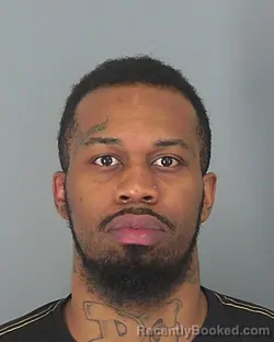 Mugshot of CHRISTAURIS THOMPSON