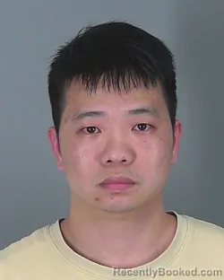 Mugshot of MINGDONG CAI
