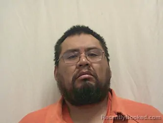 Mugshot of IDONIS HUGH PLUMMER