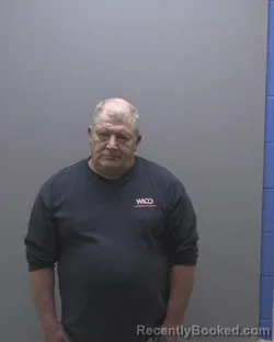 Mugshot of JAMES EDWIN DAUGHTERY