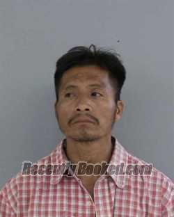 Booking photo from Madera County, California