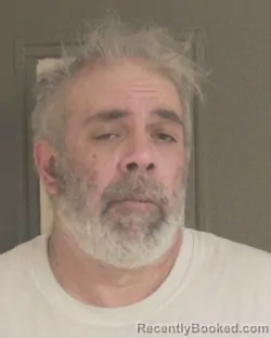 Mugshot of JESSE J III SHAY