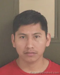Mugshot of JUAN M SANTIAGOANTONIO