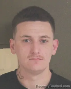 Mugshot of JOHN E LINSTROTH