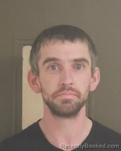 Mugshot of TRAVIS L NUTSCH