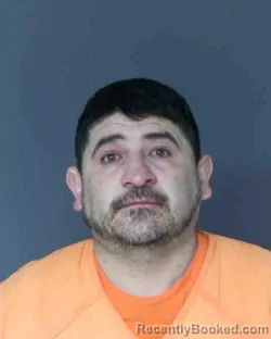 Mugshot of MANUEL FLORES-RAMOS