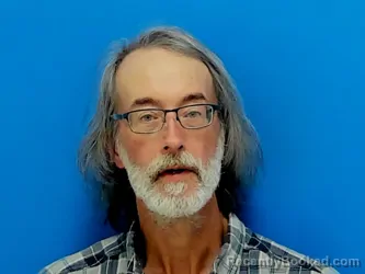 Mugshot of John Woodson Milstead