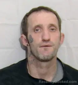 Mugshot of TRAVIS LEE LLOYD