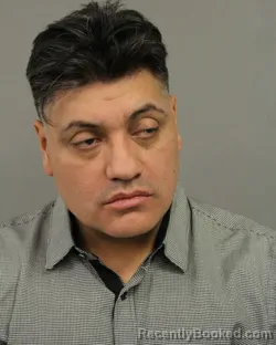 Mugshot of JUAN J LARA