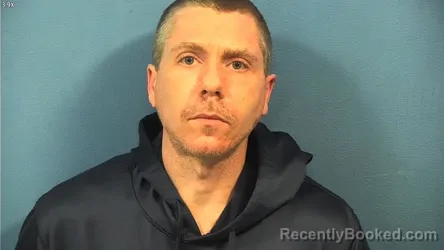 Mugshot of DOUGLAS CLUCHEY