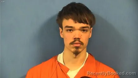 Mugshot of NEDAS REVUCKAS