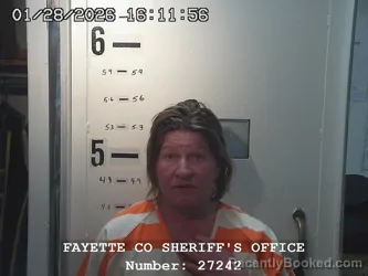 Mugshot of KELLY JO MADEKER