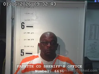 Mugshot of UFICES EARVIN