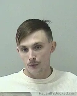 Booking photo from Kane County, Illinois