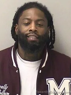 Mugshot of JUSTIN J HARPER