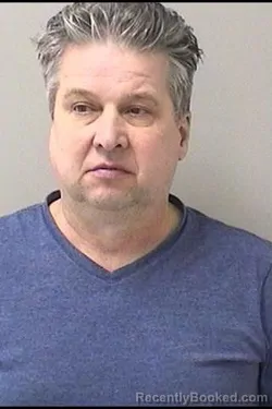 Booking photo from Kane County, Illinois