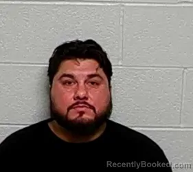Mugshot of JAVIER O COOPER