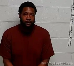 Mugshot of CORNELIUS D BROWN