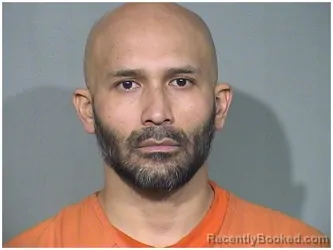 Mugshot of SANTOS ALCARAZ