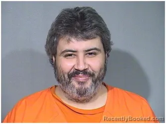 Mugshot of GUSTAVO A HENAO