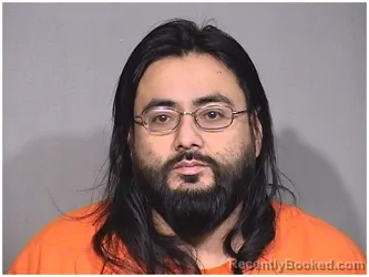 Mugshot of MARIO DELREAL