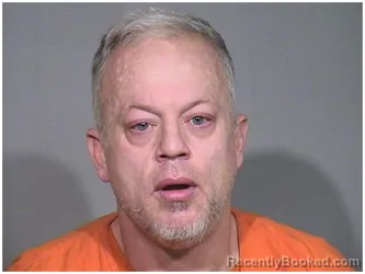 Mugshot of TREVOR ROWE