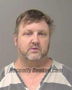 Booking photo from Macon County, Illinois