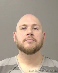 Booking photo from Macon County, Illinois