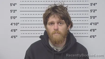 Mugshot of JUSTIN HOGUE