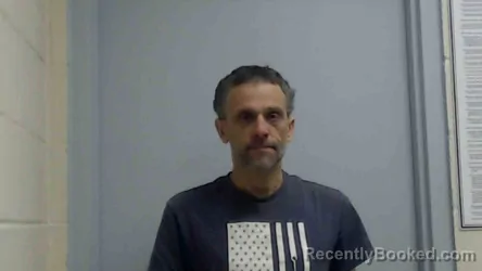 Mugshot of JUSTIN T MAGEE